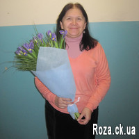 Bouquet of blue irises with greens - Photo 1