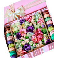 Flowers and macaroons in a rectangular box