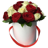Red and white roses in a hat box