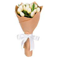 15 white tulips in paper