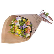 Bouquet of freesias in paper