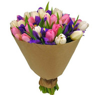 Wonderful bouquet of irises and tulips