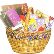 Basket of sweets with sweets and chocolate