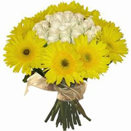 An unusual bouquet of roses and gerberas