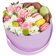 Box with flowers and macarons