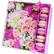 Square box with flowers and pastries