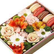 Macarons and flowers in a box