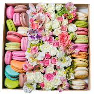 Mix of flowers in a square box with macarons