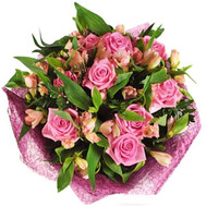 Pink roses and alstroemerias in bouquet