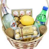 Basket for gift with vermouth and candy
