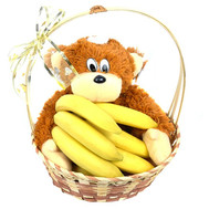 Basket with bananas and monkey