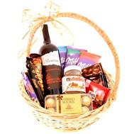 Basket with wine and chocolate