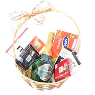 Basket of sweets with imported chocolate and champagne