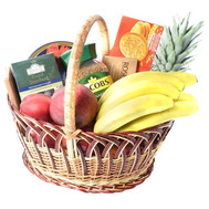 Basket with sweets and fruit as a gift