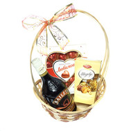 Gift basket with liqueur and sweets