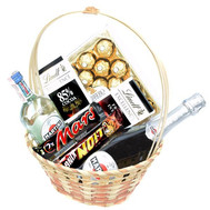 Gift basket with sweets and alcohol