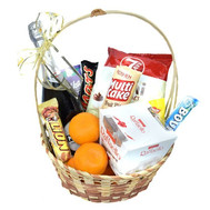 Gift basket with sweets and champagne