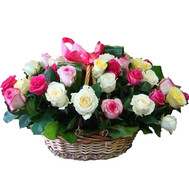 Basket with different color roses