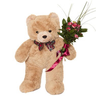 Bear and bouquet of roses