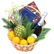 Basket for New Year with champagne and sweets