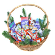 Basket with chocolate and Kinder for the New Year