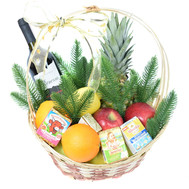 Christmas basket with fruit, wine and cheese