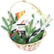 Christmas basket with champagne and chocolate