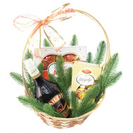 Christmas basket with liqueur and sweets