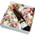 Flowers, wine and macarons in a box