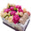 A small box with macarons and roses