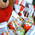 Kinder sweets and Teddy bear in the basket for the New Year 1