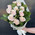Cascade bouquet of 11 cream roses 7