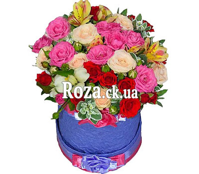 Bright round box with flowers