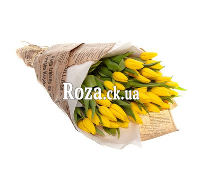 Yellow tulips in paper