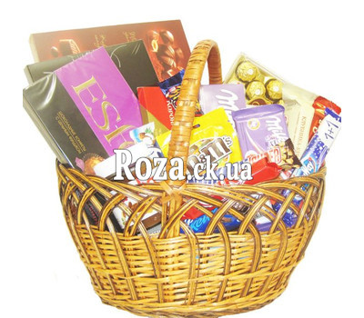 Basket of sweets with sweets and chocolate