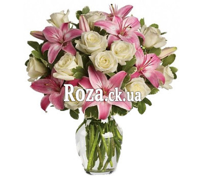 A pretty bouquet of roses and lilies