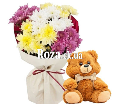 Little bear with a bouquet of chrysanthemums