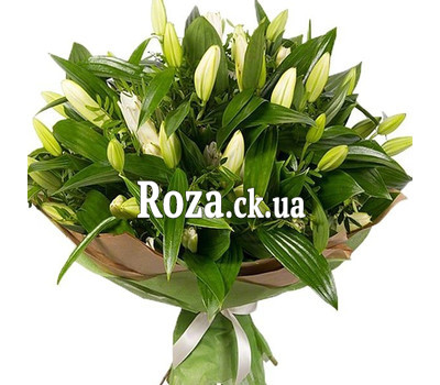 Bouquet of lilies in paper wrapping