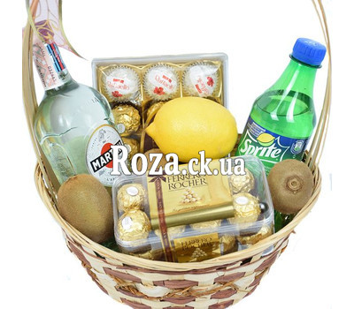 Basket for gift with vermouth and candy