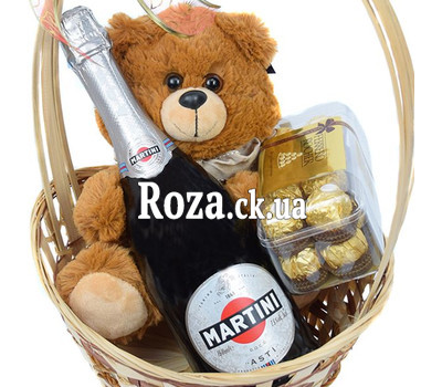 Gift basket with champagne, chocolates and Teddy Bear