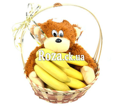 Корзина с бананами и обезьянкой