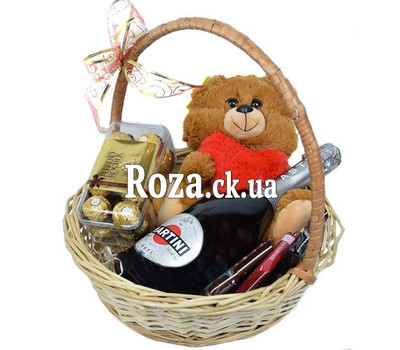 Basket of champagne, toy and sweets