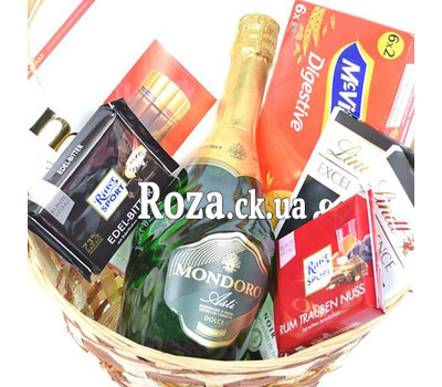 A basket of sweets with imported chocolate and champagne 2