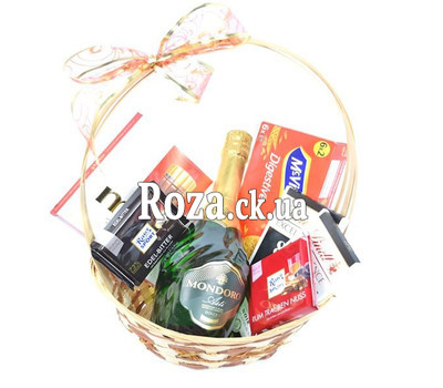 Basket of sweets with imported chocolate and champagne