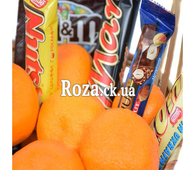 Gift basket with sweets and champagne