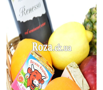 Gift basket with fruit, wine and cheese