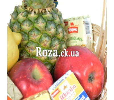 Gift basket with fruit, wine and cheese