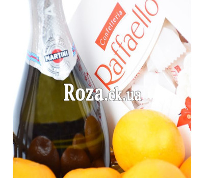 Gift basket with tangerines, champagne and Raffaello