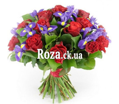 Bouquet of red roses and blue irises