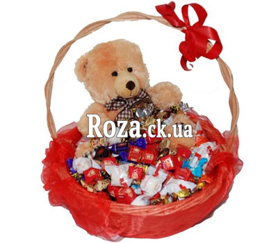 Gift basket of chocolates and teddy bear